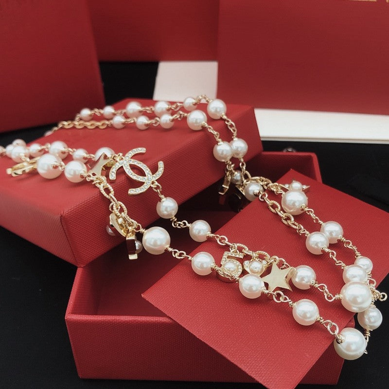 18K Chanel No.5 Star Long Pearl Necklace