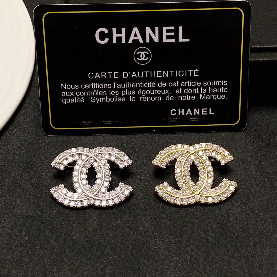 18K Chanel Diamonds Set Brooches