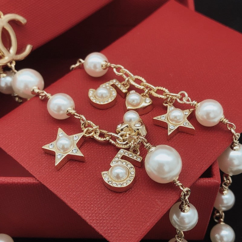 18K Chanel No.5 Star Long Pearl Necklace