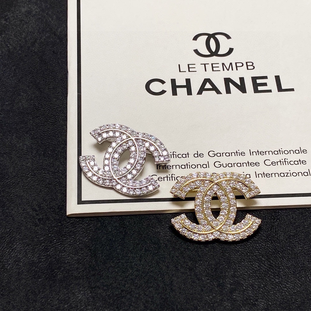 18K Chanel Diamonds Set Brooches
