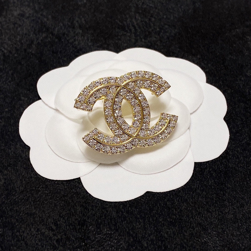 18K Chanel Diamonds Set Brooches