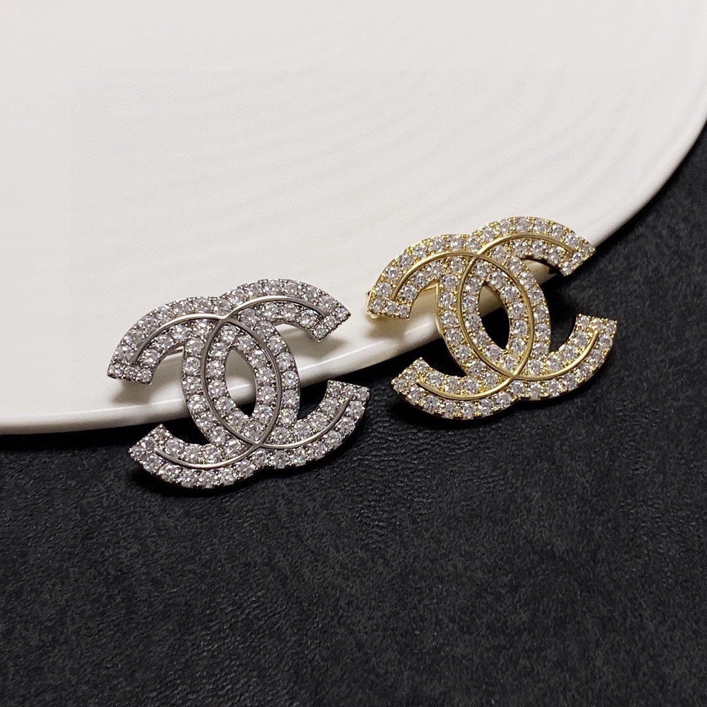 18K Chanel Diamonds Set Brooches