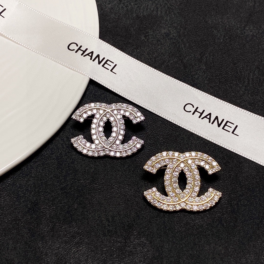 18K Chanel Diamonds Set Brooches