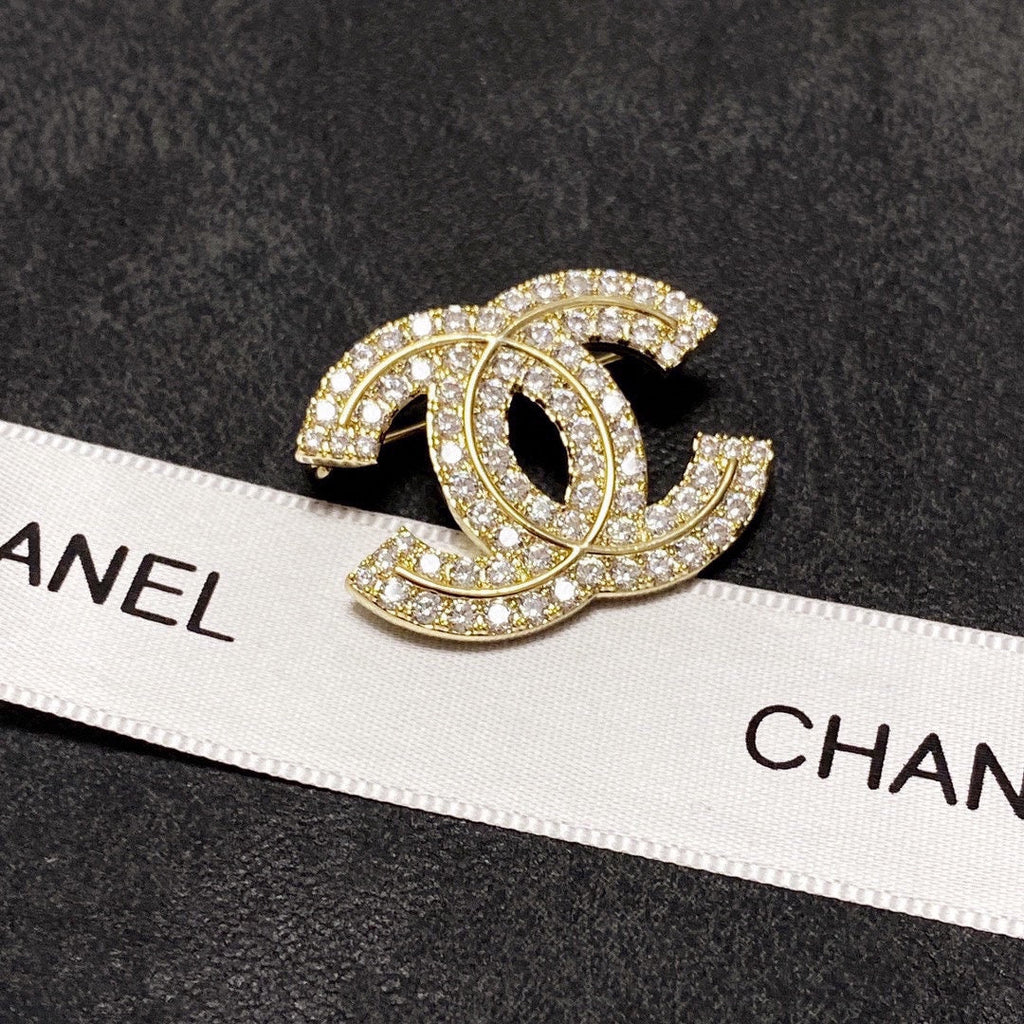 18K Chanel Diamonds Set Brooches
